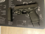 Glock 19 gen. 4 + Svitilna TLR 