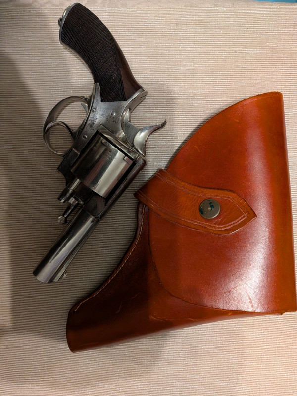 šestistranný revolver systému Webley RIC