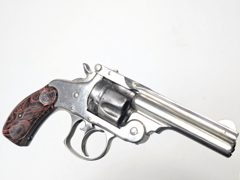 Smith Wesson .38 - dvojčinný revolver - US