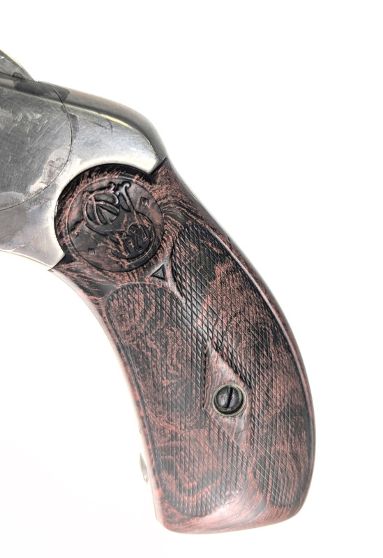 Smith Wesson .38 - dvojčinný revolver - US